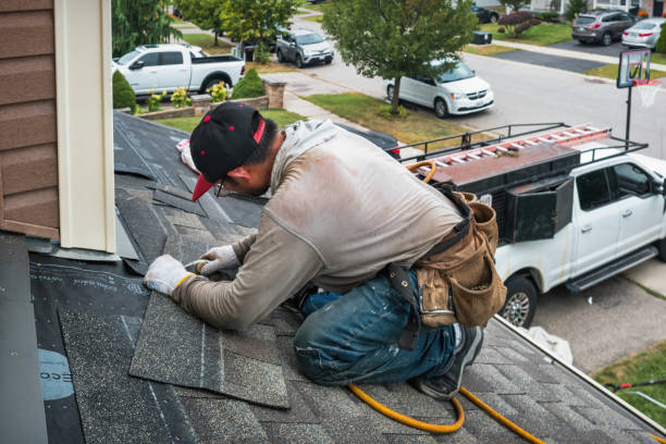 Professional Flat Roof Repair technician working in Carrboro, NC
